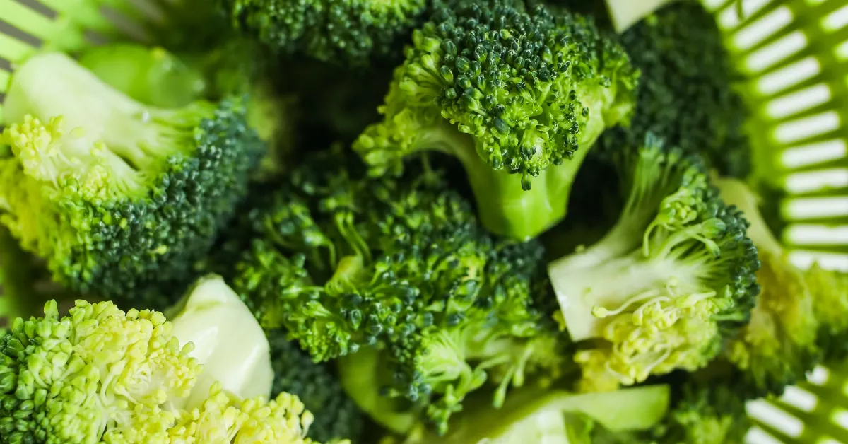 Broccoli in a strainer.